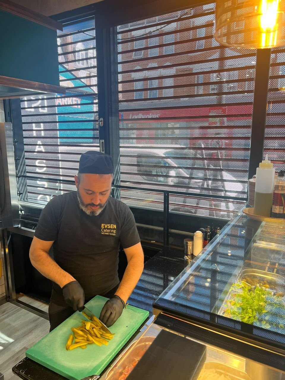 Chef Mehmet Evsen chopping fresh ingredients