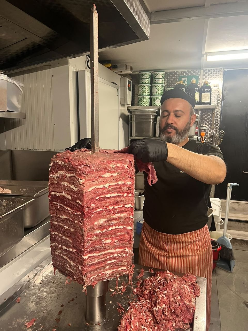 Chef preparing a homemade doner kebab